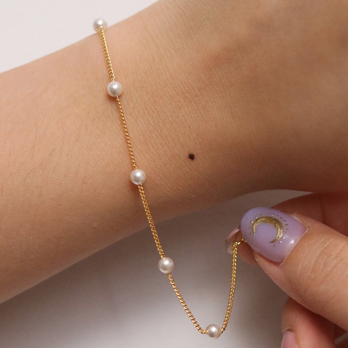 Five pearl relayed bracelet - Zyrola