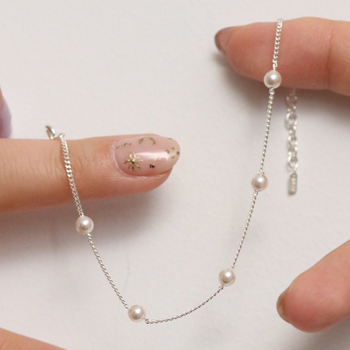 Five pearl relayed bracelet - Zyrola